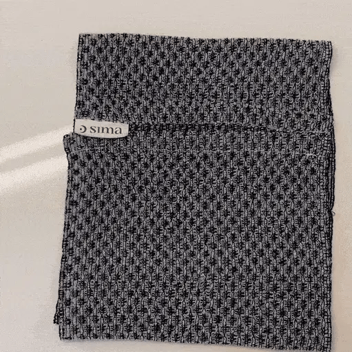 Woman using shower towel